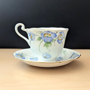 Blue Poppy vintage Hadford&#39;s Bone China by Fenton England teacup and saucer