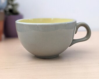 1950s Harkerware cup, gray and yellow.