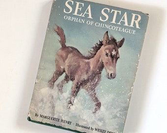 Sea Star, Orphan of Chincoteague. 1960s children's book by Marguerite Henry, illustrated by Wesley Dennis.