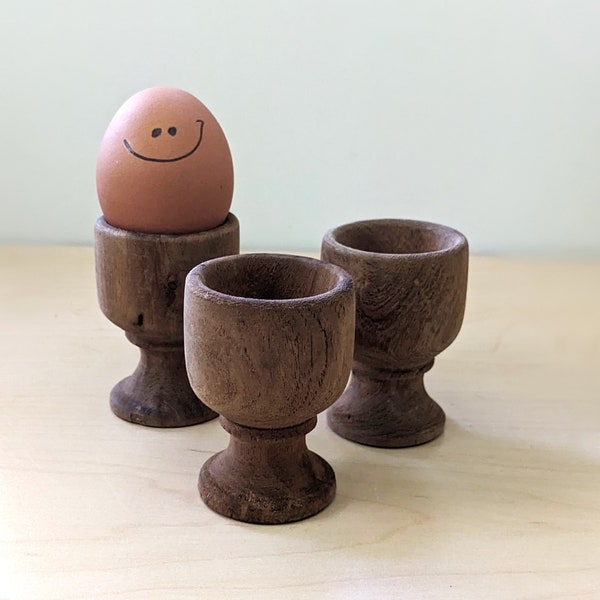 Vintage hand turned wooden egg cups, set of three.