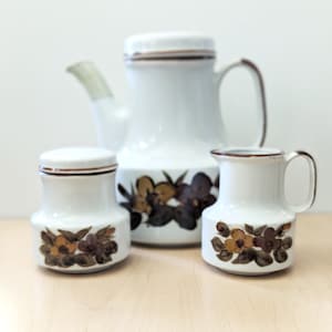 1970s mod coffee set with creamer, sugar bowl, coffee pot.
