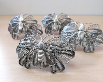 Vintage sterling silver filigree butterfly napkin rings.