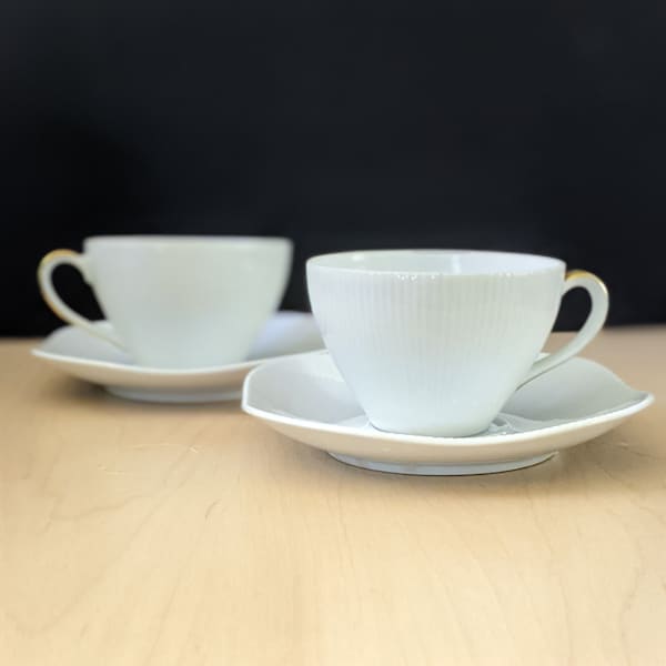 1950s Upsala Ekeby Stella mid century modern cups and saucers, set of two.