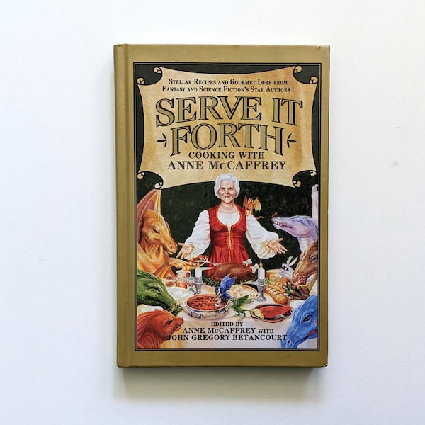Serve it Forth kookboek van Anne McCaffrey. Kookboek uit de jaren 90 van de sciencefiction- en fantasyschrijvers. Eerste editie.