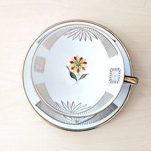 Winterling Roslau Bavaria cup and saucer, mid century German porcelain, gold trim, floral center