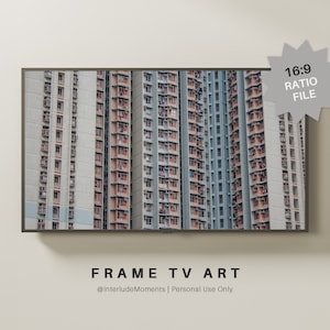 Peut inclure: Une photographie encadrée d'un horizon urbain avec de nombreux immeubles de grande hauteur. Les bâtiments sont tous très proches les uns des autres et ont de nombreuses fenêtres. La photo est au format 16:9.