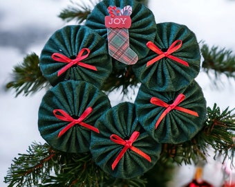 Christmas Ornament Mini Wreath Christmas Stocking Theme.  Made of 6 Fabric  Yo Yo's  5.5" diameter. From HandCrafted4You
