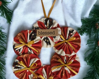 Christmas Wreath Ornament "Blessed" Made of Hand Stitched Fabric Yo Yo's Measures 5 1/2"  Diameter from HandCrafted4You