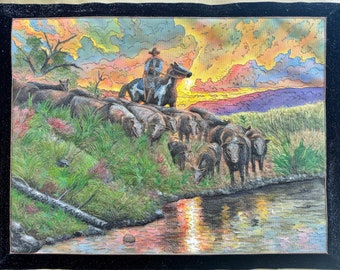 Cowherd at sunset