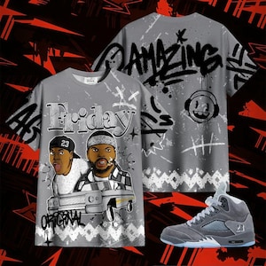 May include: Gray t-shirt with the word "Friday" and a graphic of two men with a car. The back of the shirt has the word "Amazing" in graffiti style. A gray and blue sneaker is also in the image.