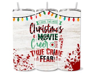 May include: Three white tumblers with a woodgrain background and red and green Christmas lights. The tumblers have the text "I have two moods: Christmas Movie Cheer or True Crime Fear!" printed on them.