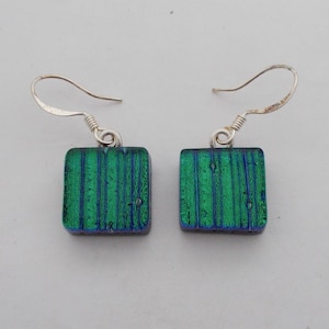 Tiny dichroic glass dangli earrings. Small dichroic earrings.