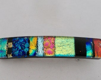 Small dichroic glass hair barrette .