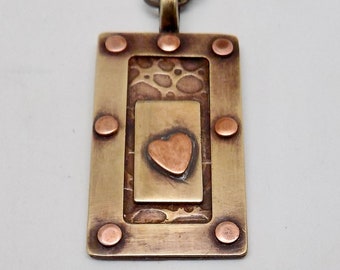 Mixed metal pendant. Steampunk pendant.heart pendant.