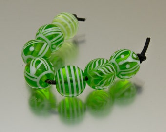 Lampwork bead set: Keep Breathing in greens and white. Lampwork by Jennie Yip