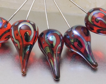 Lampwork headpins - Helix teardrops in orange and silver on sterling silver wire. Lampwork by Jennie Yip
