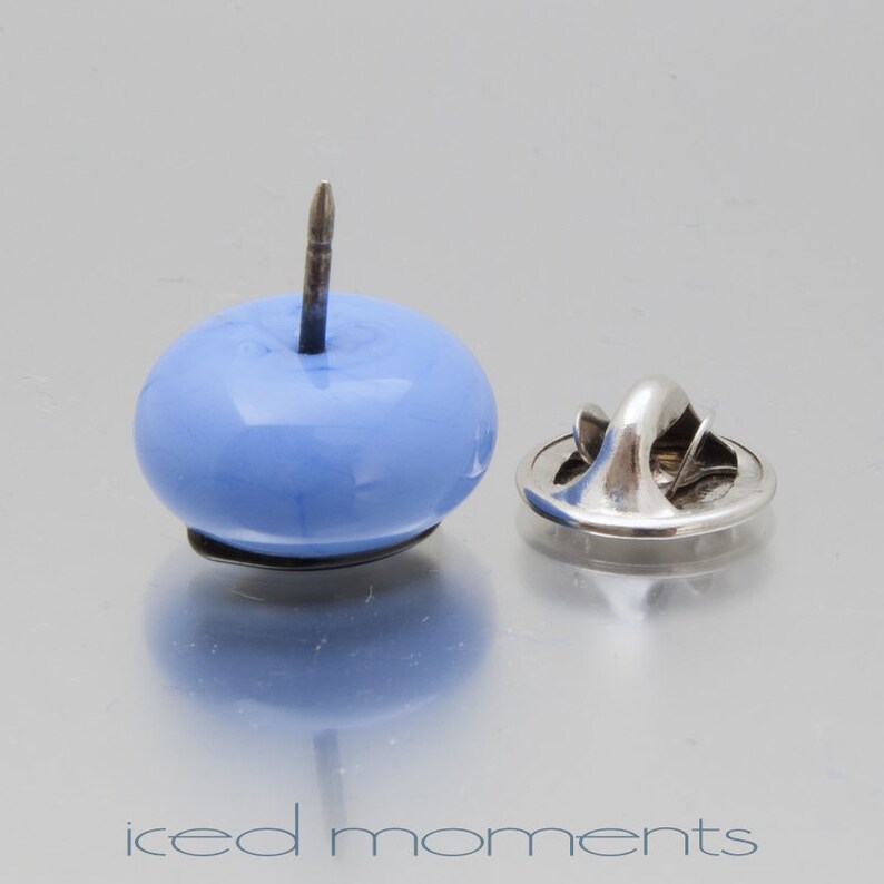 Lampwork glass by Jennie Yip At sign @ in light blue and black Lapel pin