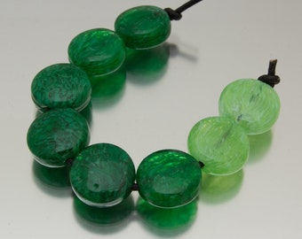 Lampwork bead set: Inner Swirl in green. Lampwork by Jennie Yip