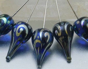 Glass headpins - Helix teardrops in sapphire and silver on sterling wire. Lampwork by Jennie Yip