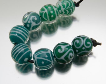Lampwork bead set: Keep Breathing in green and white. Lampwork by Jennie Yip