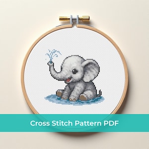 May include: A cross-stitch design of a baby elephant spraying water from its trunk, set in a blue puddle. The design is framed in a wooden embroidery hoop. The text "Cross Stitch Pattern PDF" is displayed below the image.