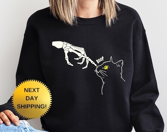 Skeleton Hand Cat Boop Sweatshirt: Funny Halloween Sweater