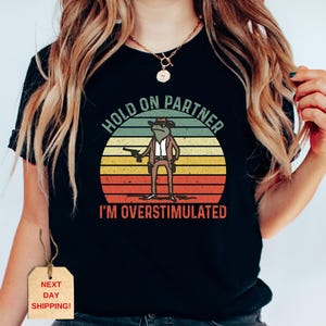 Hold On Partner Im Overstimulated Shirt, Cowboy Frog Shirt, Unhinged Shirt, Cute Animal Shirt, Funny Meme Shirt, Gen Z Shirt