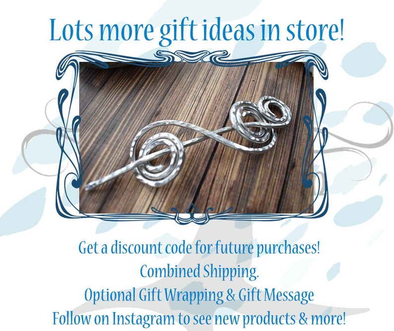 May include: A silver-colored hair stick with a spiral and loop design. The hair accessory is displayed on a wooden surface. The image includes the text "Lots more gift ideas in store!"