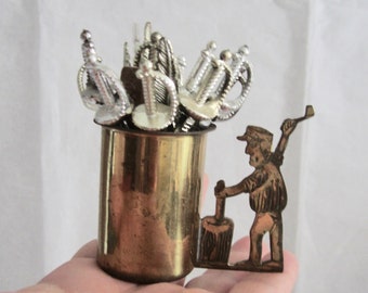 Vintage Cocktail Picks in Brass Caddy Cup w/ 16 Foodpicks Sword & Feather Picks in Blacksmith Worker Holder Ready to Serve