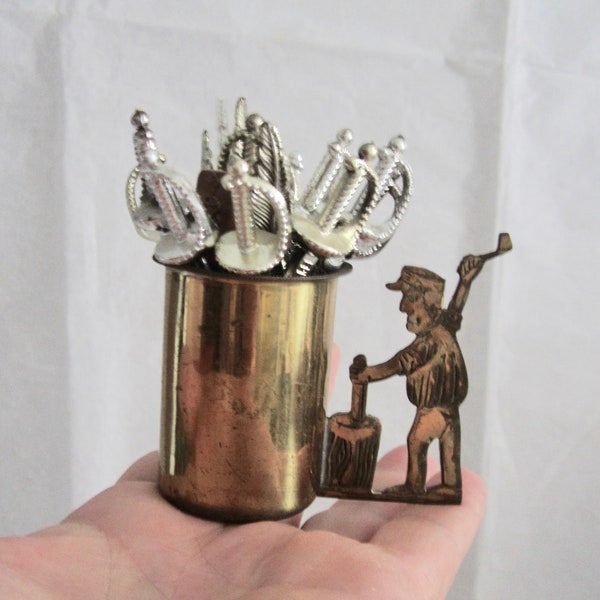 Vintage Cocktail Picks in Brass Caddy Cup w/ 16 Foodpicks Sword & Feather Picks in Blacksmith Worker Holder Ready to Serve