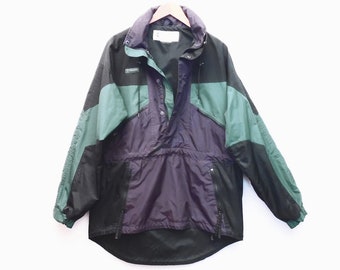 90's COLUMBIA anorak / vintage ski or snowboard jacket / stowaway hood / size M or L / color block parka