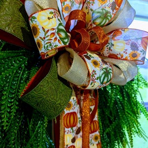 Fiocco autunnale - Fiocco multi-nastro verde/arancione/oro con zucca