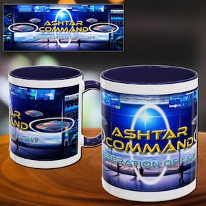 May include: White ceramic mug with a blue interior and handle, featuring the text "ASHTAR COMMAND FEDERATION OF LIGHT" in gold lettering. The design includes a futuristic scene with flying saucers and silhouettes of people.