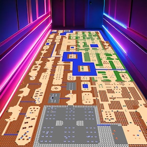 May include: A large, colorful floor rug featuring a pixelated map design. The rug showcases a retro video game aesthetic with brown, green, blue, and gray elements. The design is reminiscent of a classic adventure game, perfect for a game room or themed space.