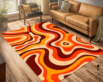 May include: Abstract area rug with a swirling pattern of orange, red, and brown. The rug has a modern, abstract design.