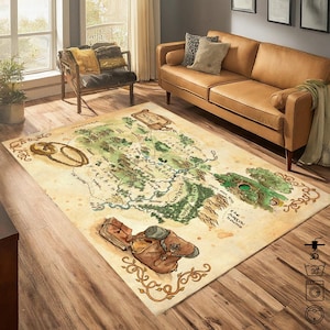 May include: A vintage-style rug featuring a detailed map of Middle-earth from The Lord of the Rings. The map is surrounded by a decorative border with floral motifs. The rug is beige with green, brown, and black accents.