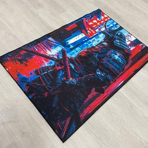 May include: A blue and red abstract design with a samurai warrior in black armor holding a sword. The warrior is standing in front of a red and blue background with Japanese characters.