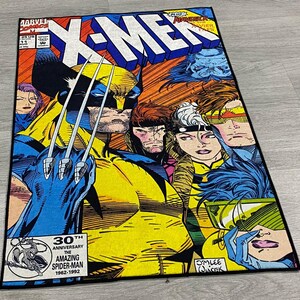 May include: A colorful comic book cover featuring the X-Men, with Wolverine in the foreground, his claws extended. The cover features the title "X-Men" in large, bold letters and the text "30th Anniversary The Amazing Spider-Man 1962-1992".