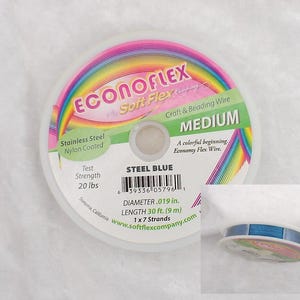 May include: A spool of steel blue Econoflex craft and beading wire. The label includes the text "Stainless Steel Nylon Coated", "Test Strength 20 lbs", and "DIAMETER .019 in. LENGTH 30 ft. (9 m)". The spool has a rainbow design.