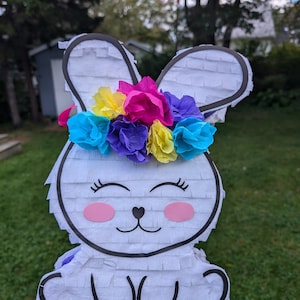 Beautiful Bunny piñata for kids party. Pinata party. Piñata game