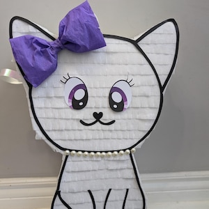 Cat piñata, purple cat, kitten pinata for kids. Pinata game