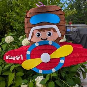 Big Airplane piñata for kids birthday party. Pinata game