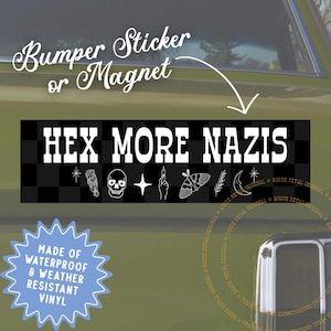 May include: A black and white bumper sticker or magnet with the text "HEX MORE NAZIS" in bold white letters. The design includes a checkered background and various small white illustrations.