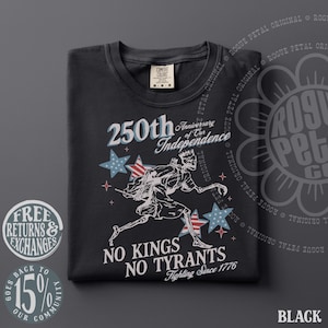 May include: Black t-shirt with a graphic celebrating the 250th anniversary of independence. The design includes stars, a running figure, and the text "No Kings No Tyrants Fighting Since 1776."