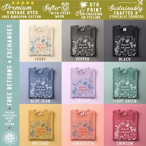 Puede incluir: Una colecci&oacute;n de nueve camisetas en varios colores, cada una con la frase "friends not food" con ilustraciones de animales. Los colores incluyen marfil, pimienta, negro, azul vaquero, orqu&iacute;dea, verde claro, mostaza, terracota y carmes&iacute;. Las camisetas est&aacute;n te&ntilde;idas vintage y son 100% algod&oacute;n ringspun.