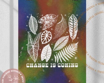 May include: A poster featuring a collection of white botanical leaf illustrations against a colorful, blended background of blue, green, and red. The text "CHANGE IS COMING" is displayed in white. The poster is held by black binder clips.