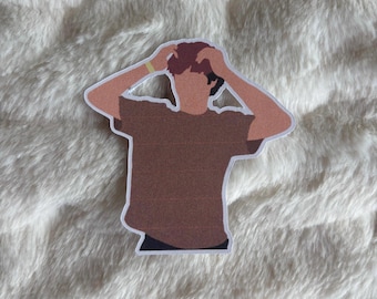 Naklejka na czerwone włosy Malachiego Bartona