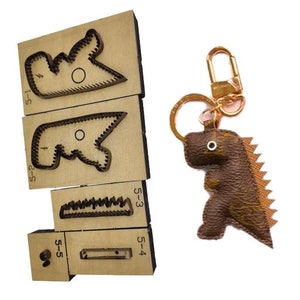 Petit pendentif dinosaure en cuir découpé moule, personnalisation faite main en cuir, artisanat du cuir outil Kraft