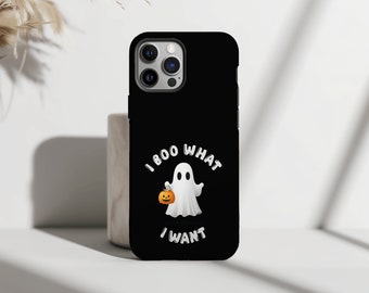 Puede incluir: Carcasa negra para iPhone con un fantasma blanco que sostiene una calabaza y el texto "I BOO WHAT I WANT".