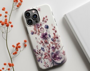 Puede incluir: Una funda blanca para iPhone con un diseño floral con flores rosas y moradas, hojas y cristales.